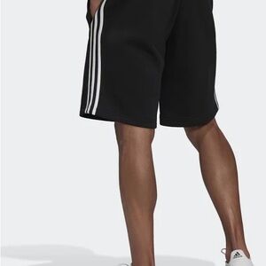 Adidas Black and White Athletic Shorts with Signature Stripes
